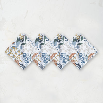 napkin with a mixture of floral, geometric, and retro botanical prints, in a refreshing color palette 