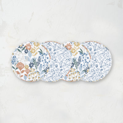 round placemat with a mixture of floral, geometric, and retro botanical prints, in a refreshing color palette 