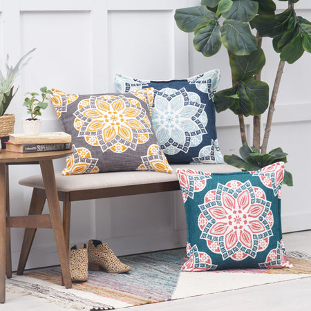 Mary Decorative Pillows featuring floral medallion print, hand embellished details, and a vibrant color palette. 