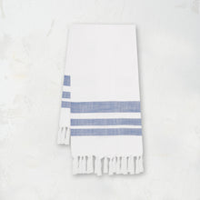 woven kitchen towel with blue stripes on a white background