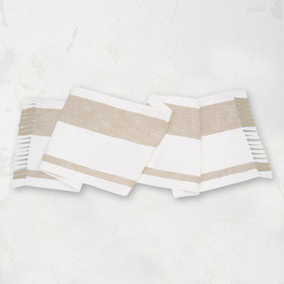 woven cotton table runner with light brown stripes and fringed edges