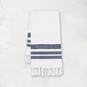 woven kitchen towel with dark blue stripes on a white background