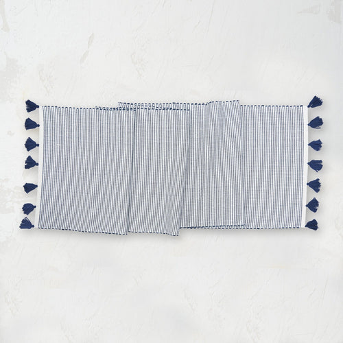 indigo and white striped handwoven placemat with tassels